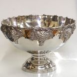 A large modern chrome plated pedestal punch bowl, relief grapevine decoration, diameter 38cm