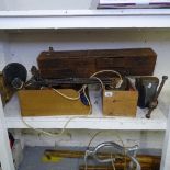 A collection of various hand tools, bench vice, desk angle-poise lamp etc