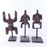 3 Cameroon Fali carved wood betrothal figures, decorated with beads and shells, tallest 27cm