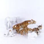 A porcelain tiger, length 36cm, 2 USSR foals, and a tiger cub, and Royal Doulton doves etc (6)