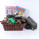 A box of toys, including walkie talkies, Action Men uniforms etc