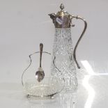 A moulded glass Claret jug with silver plated mounts, pressed Falstaff silver plate, and a glass jam