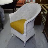 A white painted Lloyd Loom bedroom chair