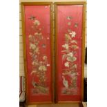 A large pair of Chinese silk embroidered panels, exotic birds, butterflies and flowers, framed,