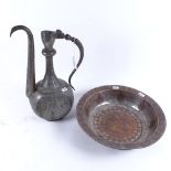 A Turkish silver plate on copper wine ewer, and a similar engraved bowl, diameter 30.5cm (2)