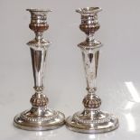 A pair of Victorian silver plate on copper candlesticks, height 26.5cm