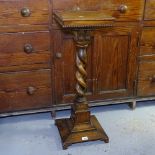 A Gothic oak lectern, on spiral turned column and platform base, H84cm