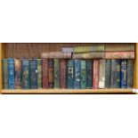 G A Henty, shelf of various books