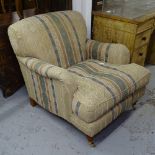 A Howard style upholstered armchair, circa 1995, from the Highly Sprung Ltd company