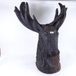 A carved wood study of a stag's head, height 78cm