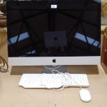An Apple 27" iMac computer, circa mid-2011, 2.7GHz quad core i5 processor with 8GB RAM 1Tb HD with