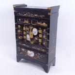 A Japanese gilded black lacquer kodansu table-top jewellery cabinet, hinged lid with drawers and