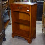 A reproduction ebony-strung yew wood cabinet with drawer and open shelf, with bracket feet, W51cm,