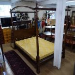 An early 20th century mahogany four poster bed with arched canopy, W137cm, L210cm, H205cm