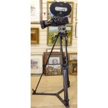 A Vintage BBC TV Arriflex BL 16mm movie camera, with zoom lens, on Vinten 5 tripod stand