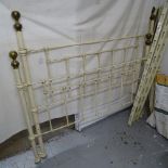 A painted cream and brass 4'6" double bed