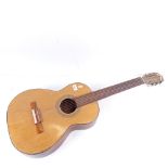 A 3/4 size acoustic guitar with nylon strings, length 97cm