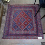 A red ground Gazak rug, 118cm x 122cm