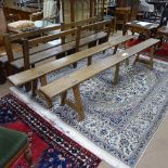 A pair of 19th century Continental fruitwood A-frame benches, L250cm, H47cm