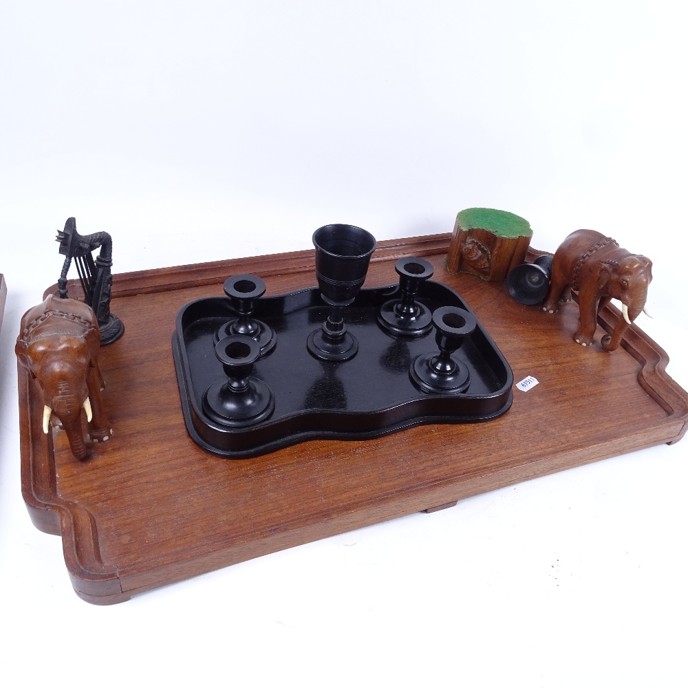A tea tray with carved elephant figure handles, an embossed copper plaque, a musical instrument, a - Image 2 of 2
