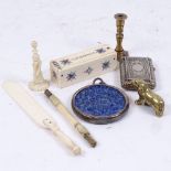 A miniature bone domino set, a Chinese pierced lapis pendant, a silver plated Vesta case, a doll's