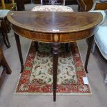 A Regency style reproduction mahogany demilune console table, with satinwood and ebony stringing, on