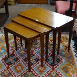 A rectangular mid-century nest of 3 teak occasional tables, widest 65cm