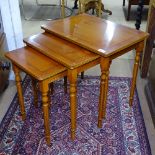 An ebony-banded yew wood nest of 3 occasional tables, widest 54cm