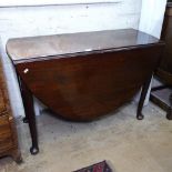 An 18th century mahogany drop leaf dining table, on cabriole legs and pad feet, W107cm, H72cm