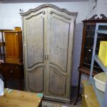A large Continental oak 2-door armoire, W126cm, H226cm, D60cm