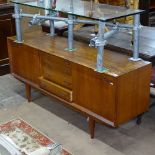 A mid-century teak sideboard with fitted drawers, L160cm, H70cm, D45cm