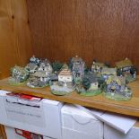 A quantity of miniature Danbury Mint models, including the Smithy and the Boathouse, boxed