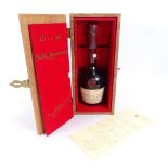 A bottle of 1975 200 Years Commemorative Martell Cognac