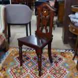 A 19th century mahogany shield-back hall chair