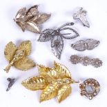 Various costume brooches, to include Flora Danica, silver-gilt leaf design brooches etc