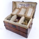 A dome-top travelling trunk design table-top jewellery casket, containing various costume jewellery,