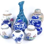 A quantity of Oriental ceramics, including Prunus pattern ginger jars, turquoise glaze figural spill