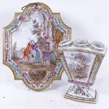 A 19th century French faience hand painted porcelain wall sconce plaque, marked Lille 1767, and a