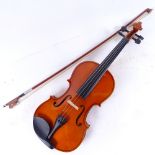 A child's modern violin, 14", in fitted carrying case, with bow