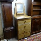 A narrow pine dressing chest with 4 short drawers, W62cm, H150cm, D50cm
