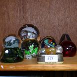 Various glass paperweights, including a view of Rye on wooden stand etc