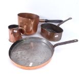 An Antique copper frying pan, diameter 29cm, 2 copper pans, and a side pouring jug (4)