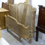 A carved giltwood bergere 5' bed
