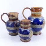 A graduated set of 3 Doulton Lambeth stoneware Queen Victorian Diamond Jubilee jugs, largest