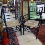 A pair of Victorian Sussex elbow chairs, in the manner of Morris & Company