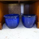 2 similar blue glazed terracotta garden pots