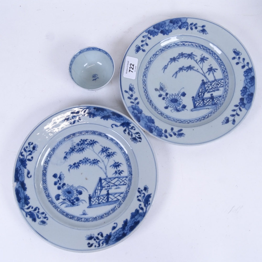 A pair of Chinese blue and white porcelain plates, hand painted bamboo designs, diameter 23cm