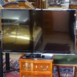 A Panasonic 42" flat screen TV with remote, GWO