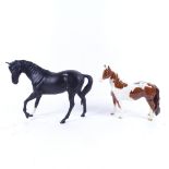 A Beswick Skewbald pony, height 17cm, and a Royal Doulton black horse