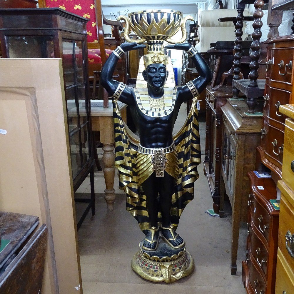 A composite black and gilded statue, study of an Egyptian pharaoh, height 138cm